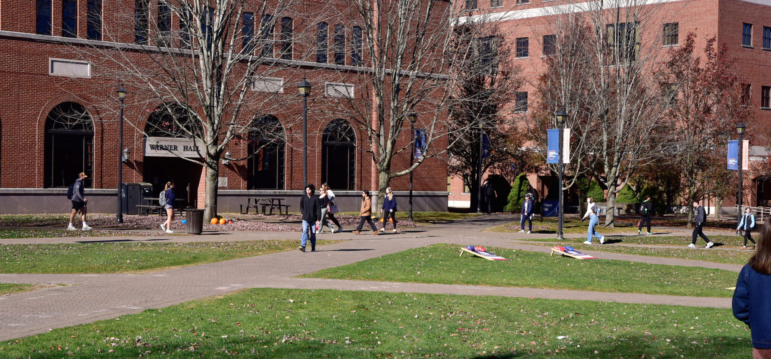 Students walking outside to and from class