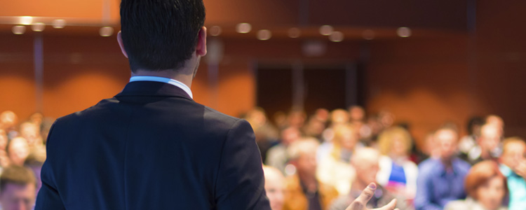 Businessman speaking at conference