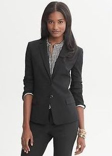 Photo of woman in business wear.
