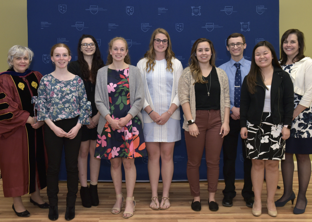 seven of the Convocation Awardees standing with Dr. Mead and Dr. O'Callaghan