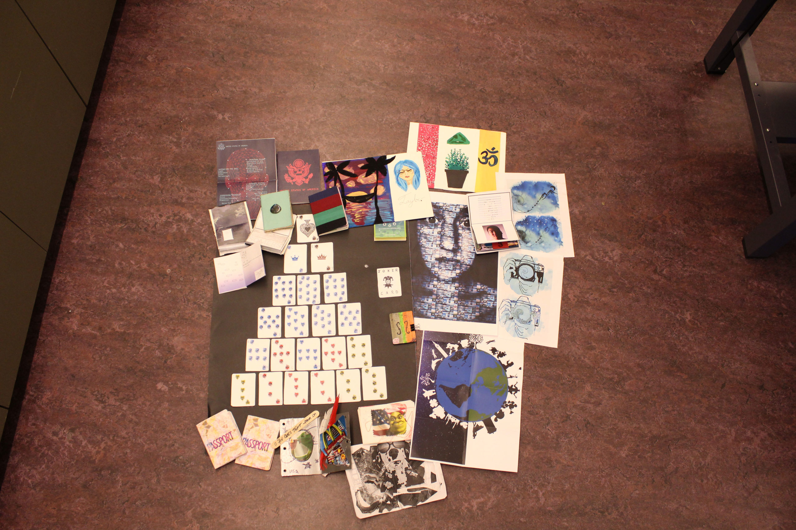 A collection of many of the previous passports, including the ones with waves, the hammock silhouette, and the world/globe.