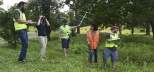image of : The terrapin tracking team tests field equipment techniques and recording protocols on pond turtles and birds at a local cemetery. 