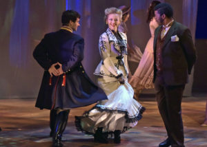 image of : (l-r): Michael Ricciardone, of Southington; Kelsey Lepesko, of Stratford; and Isiah Bostic, of Hamden, in a scene from WCSU’s production of “A Little Night Music.”