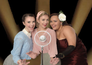image of (l-r): Grace McGovern, Victoria Wall and Cynthia Rivera in a scene from "The 1940's Radio Hour"