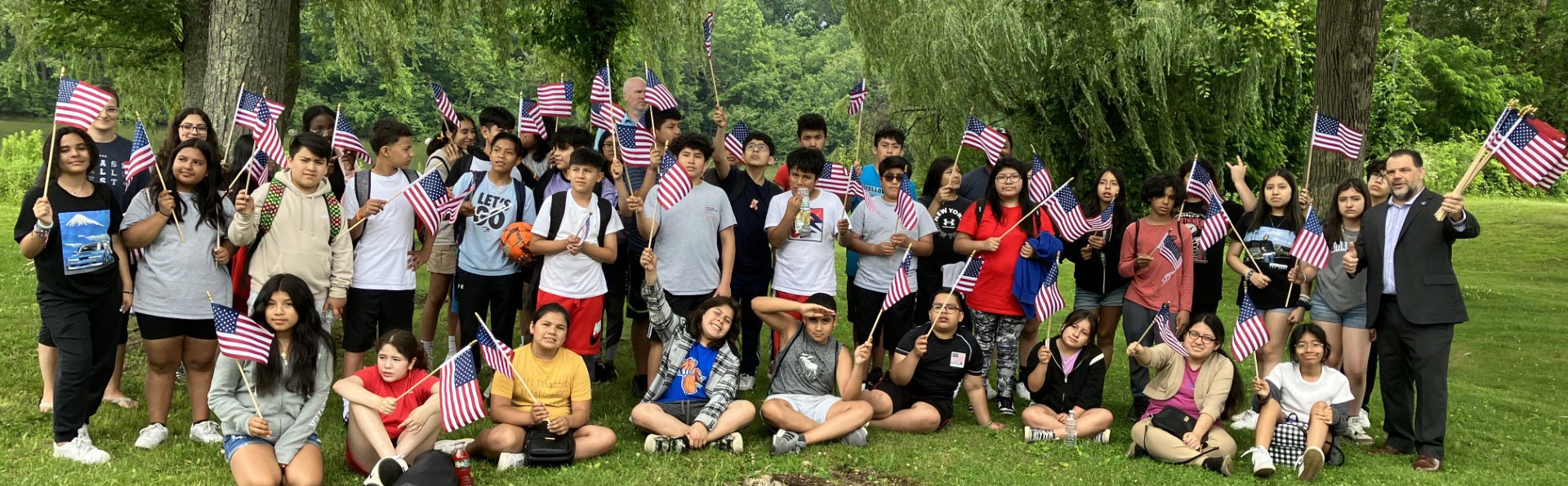 Excel students with flags