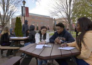 Students Studying with Quad in the background