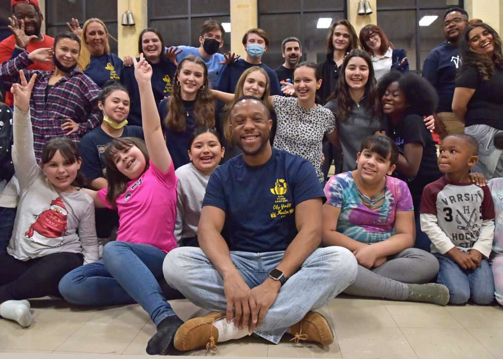 Shelby Davis surrounded by students