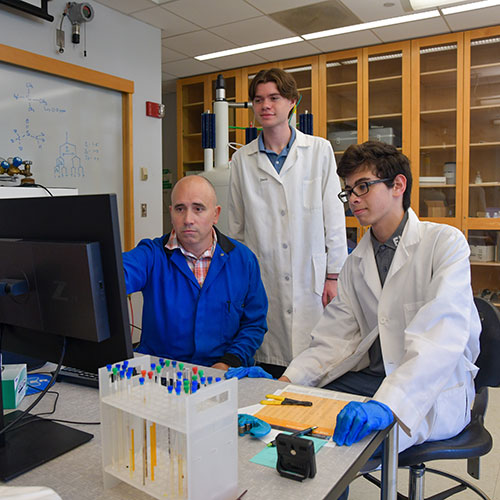WestConn professor of Chemistry Dr. Nicholas J. Greco, teaching high school students