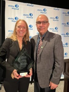 M.H.A. student Tracey Dolan with Interim Dean of the Ancell School of Business and Professor of Healthcare and Operations Management Dr. Yaseen Hayajneh