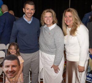 2026 CT Teacher of the Year Brian Betesh and his daughter Avery are congratulated by Connecticut Education Association President Kate Dias and NEA-Danbury President Erin Daly. (Photo credit: CEA)