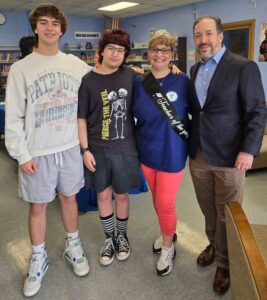 Teacher of the Year September Baraquin with her sons Stephen Jr. and Aaron, and her husband Stephen.