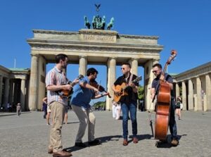 Tom Polizzi, guest artist David Chernack, Charlie Widmer and Matt Curley at the Brandenburg Gate (photo credit Marton Szilagyi)