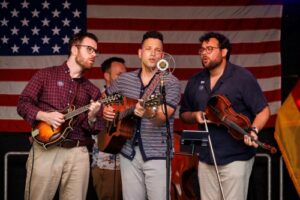 Tom Polizzi, Matt Curley, Charlie Widmer and guest artist David Chernak perform at the U.S. Consulate General Hamburg’s 250th Independence Day Celebration at the BallinStadt Emigration Museum