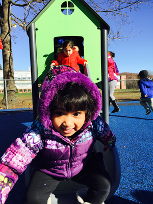 Image of a child using the WCSU Child Care Center playground