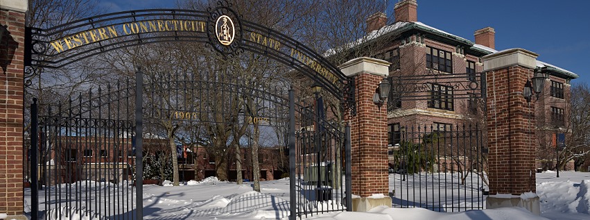 Campus Gates & Old Main in the Snow