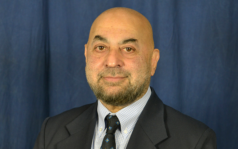Dr. Mohinder Dugal