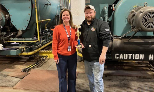 Deanna and Kyle accepting award